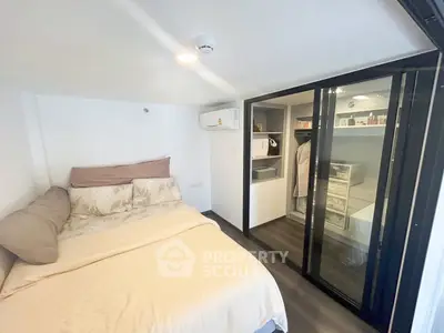 Cozy bedroom with modern design and ample storage space