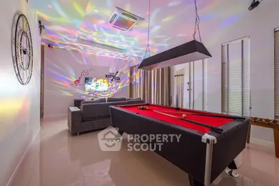 Luxurious entertainment room with pool table and modern lighting