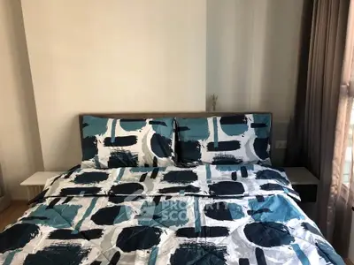 Cozy bedroom with modern bedding and natural light