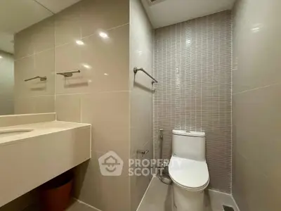Modern bathroom with sleek design and neutral tones