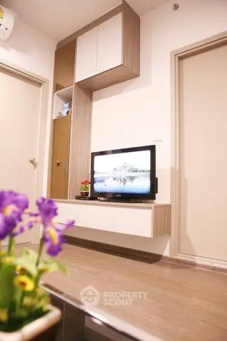 Modern living room with sleek TV unit and stylish decor