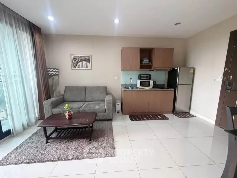 Modern living room with open kitchen and stylish decor