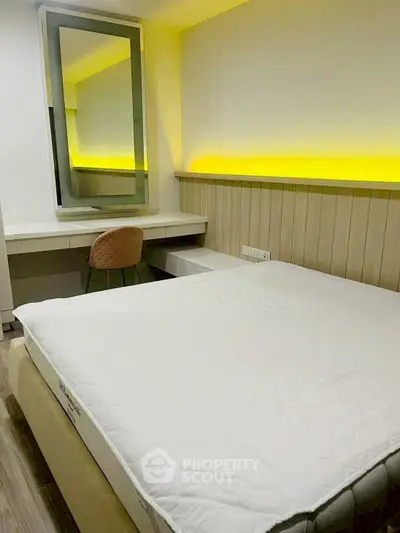 Modern bedroom with stylish lighting and cozy decor