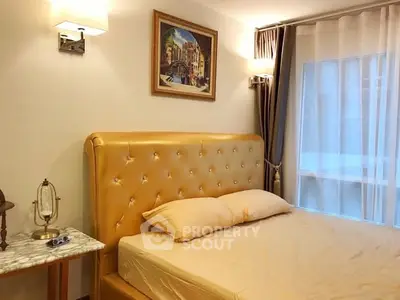 Luxurious bedroom with elegant decor and plush headboard