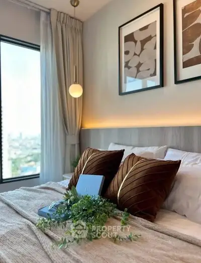 Luxurious bedroom with elegant decor and stunning city view