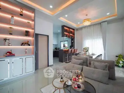 Luxurious modern living room with elegant decor and open kitchen layout