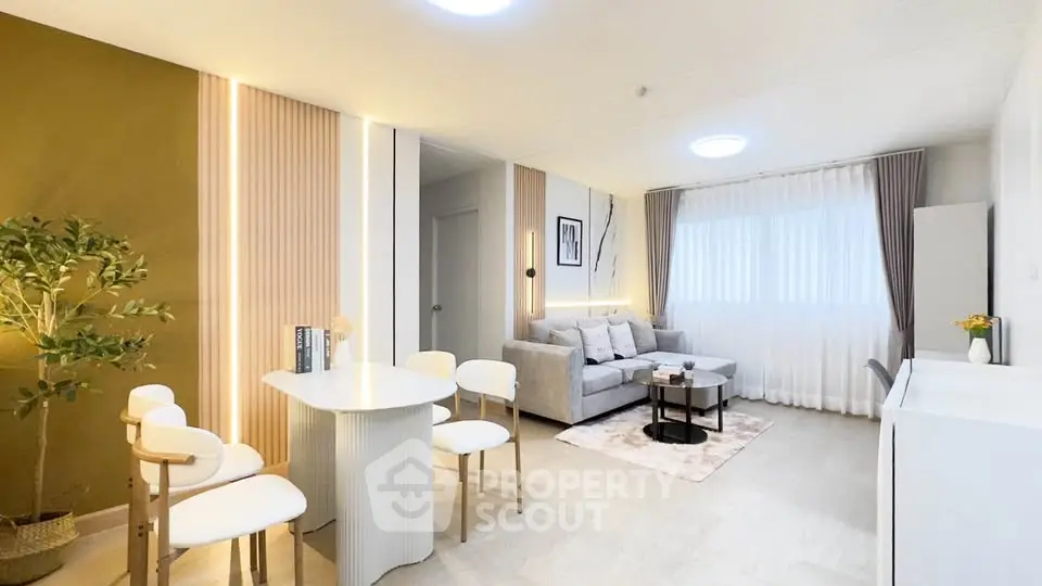 Modern living room with stylish decor and cozy seating area