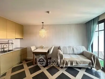 Modern living room with open kitchen and elegant dining area