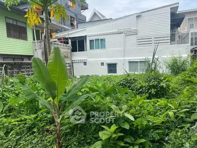 Charming residential property with lush garden and modern exterior in a serene neighborhood.