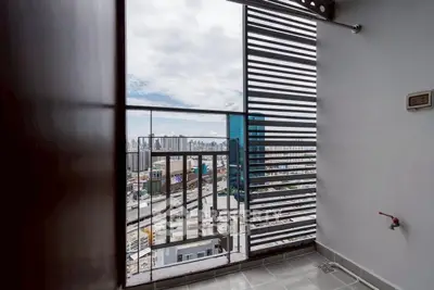 Modern balcony with city view and sleek railing design