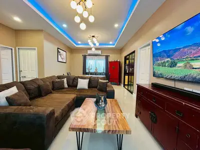 Spacious modern living room with stylish decor and large sectional sofa