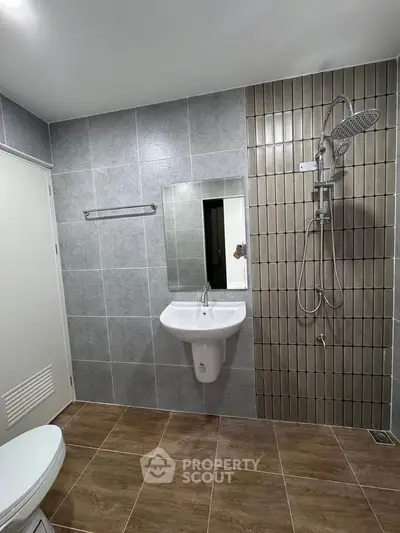 Modern bathroom with sleek shower and stylish tile design