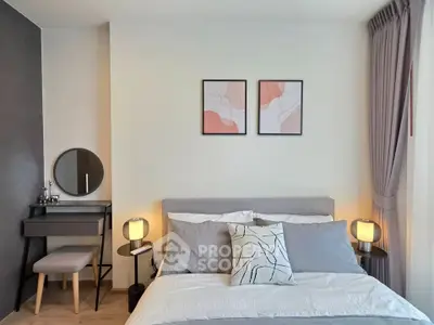 Modern bedroom with stylish decor and cozy ambiance, featuring a comfortable bed and elegant lighting.