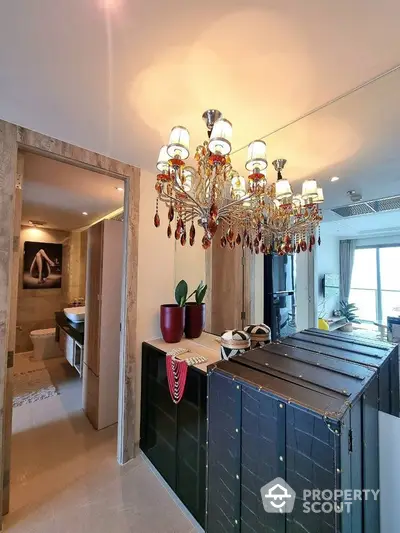 Luxurious apartment interior with elegant chandelier and modern decor