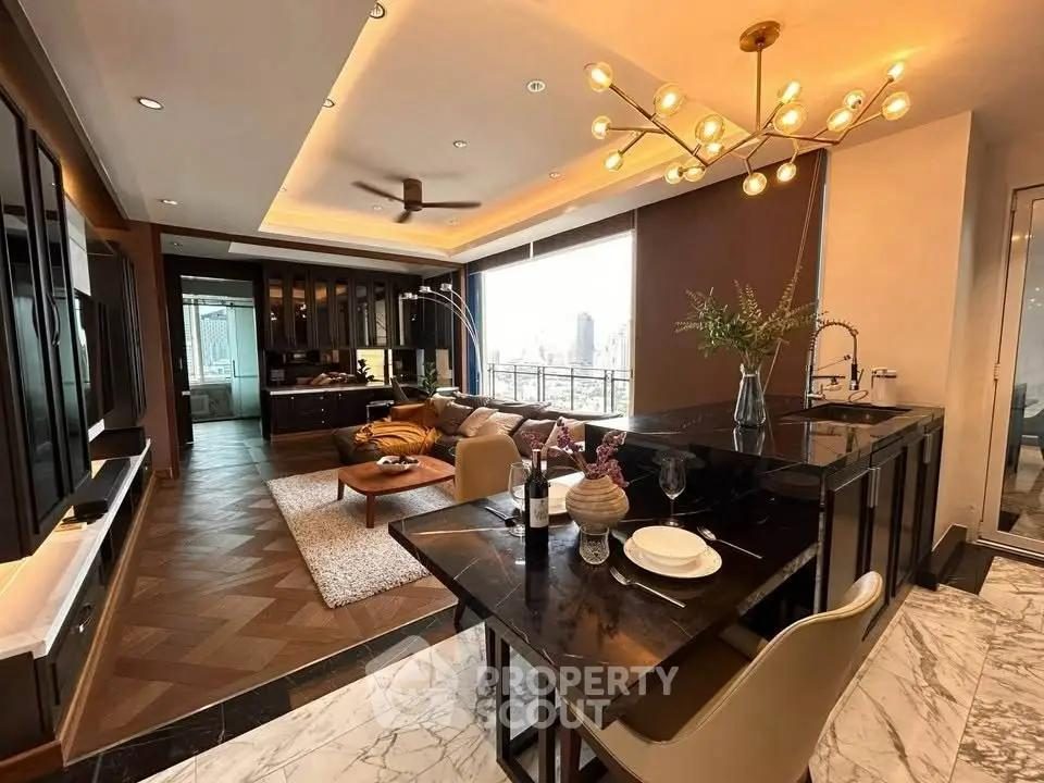Luxurious open-plan living room with modern kitchen and stunning city view