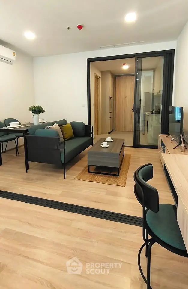 Modern living room with stylish furniture and open layout in a contemporary apartment.
