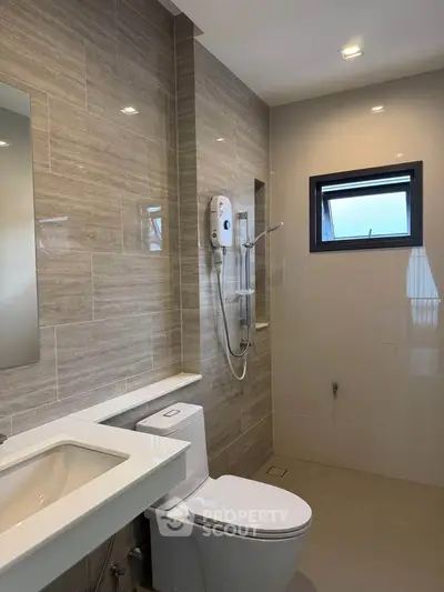 Modern bathroom with sleek design and natural light