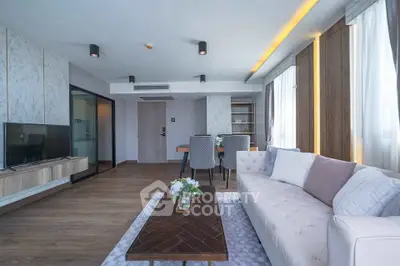 Spacious modern living room with elegant decor and natural light
