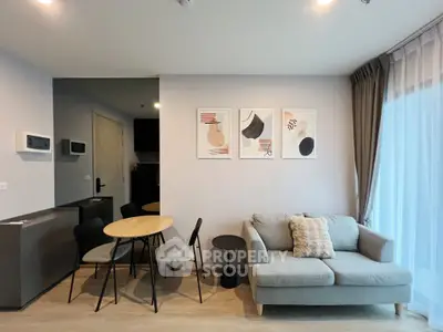 Modern living room with stylish decor and cozy seating area, perfect for relaxation.