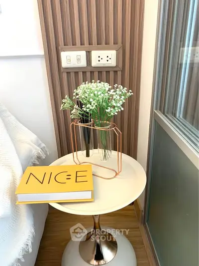 Stylish modern interior with elegant side table and decorative accents