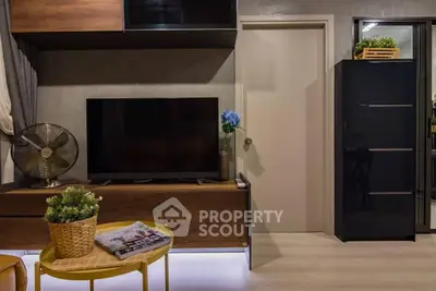 Modern living room with stylish decor and entertainment setup