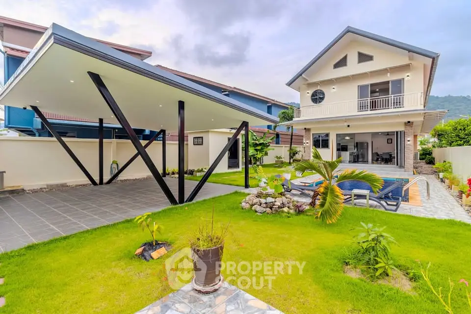Stunning modern house with spacious garden and pool, perfect for family living.