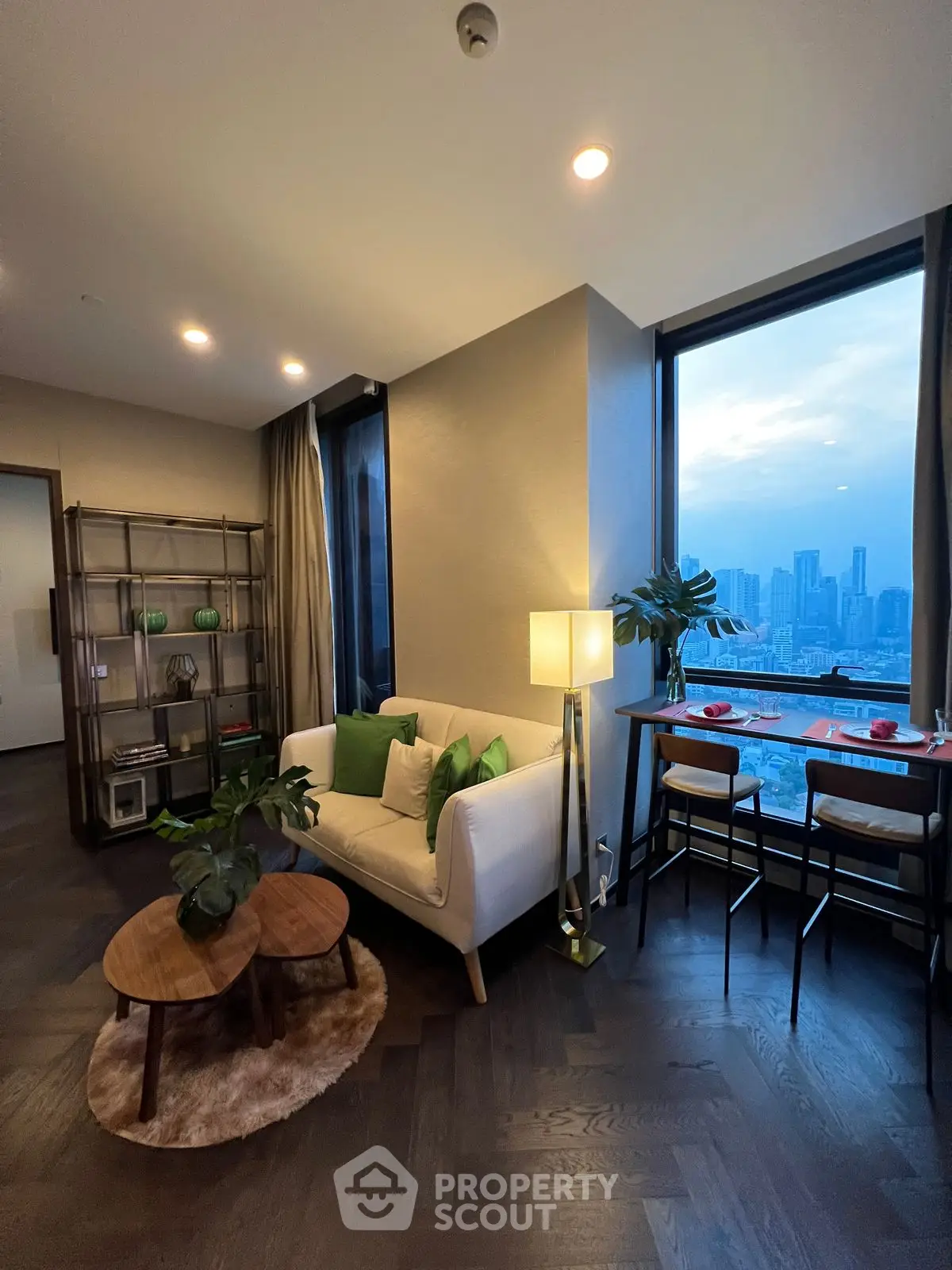 Luxurious living room with stunning city view and elegant decor