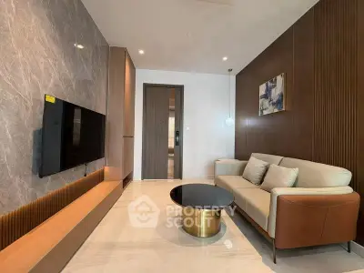 Modern living room with sleek design and wall-mounted TV