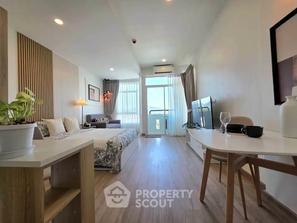 Spacious modern studio apartment with stylish decor and natural light