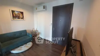 Cozy living room with modern decor and air conditioning unit