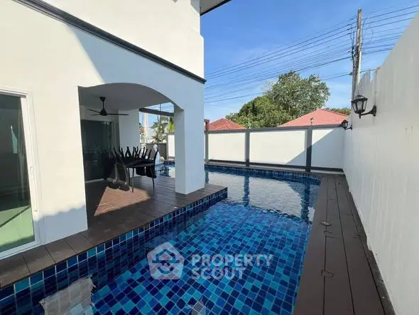 Luxurious private pool area with modern design and spacious deck, perfect for relaxation and entertainment.