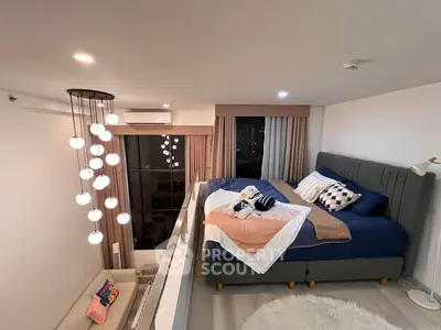 Modern loft bedroom with stylish lighting and cozy decor