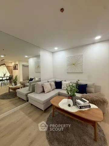 Stylish modern living room with cozy sectional sofa and elegant decor