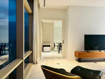 Luxurious modern living room with city view and sleek furniture