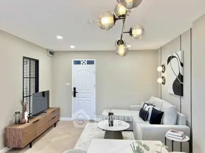 Modern living room with stylish decor and contemporary lighting