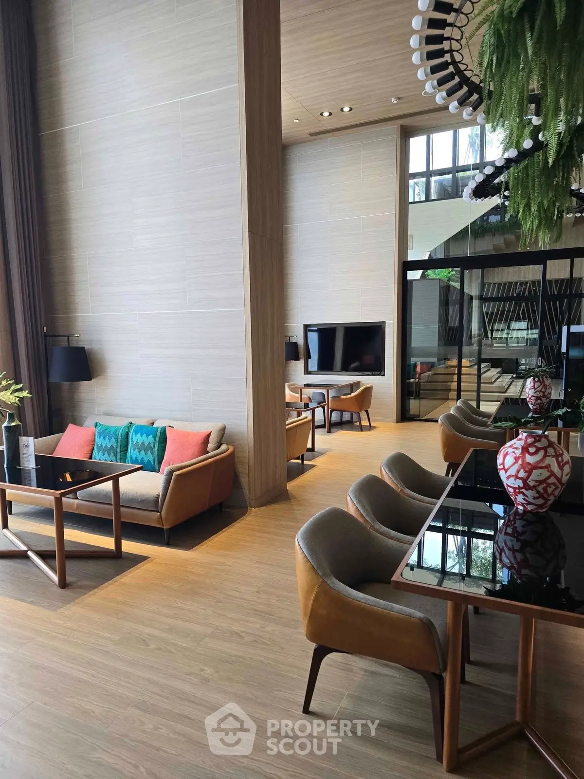 Luxurious modern living room with elegant decor and floor-to-ceiling windows