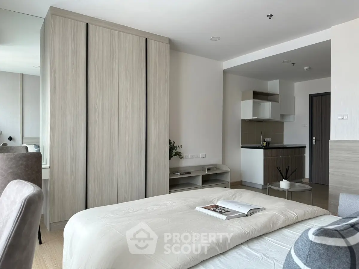 Modern bedroom with stylish wardrobe and cozy decor