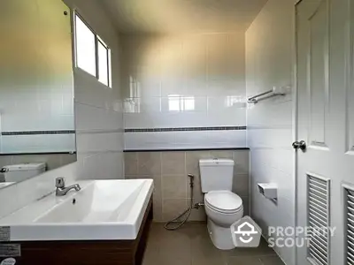 Modern bathroom with sleek fixtures and natural light