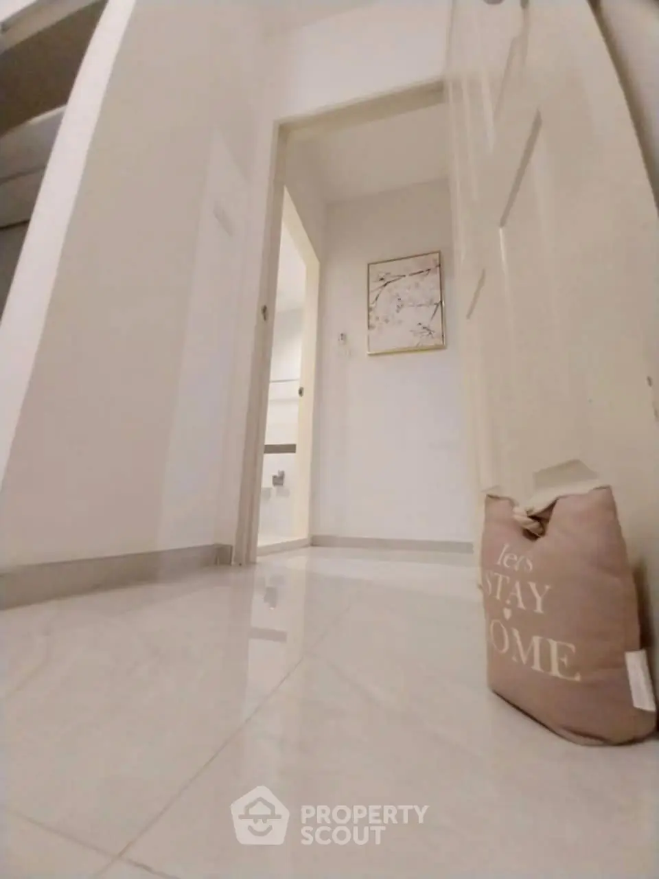 Inviting hallway with modern decor and cozy ambiance
