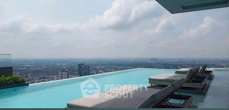 Stunning rooftop infinity pool with breathtaking city views.