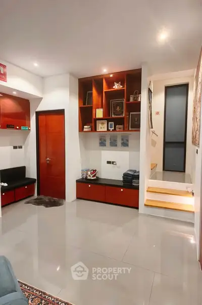 Modern living room with sleek design and built-in storage solutions