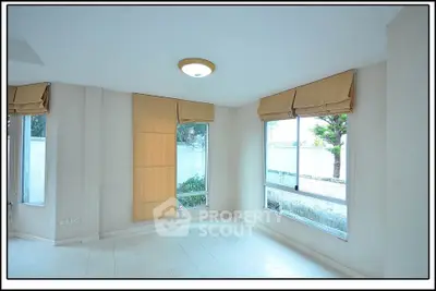 Spacious and bright corner unit with large windows and natural light.