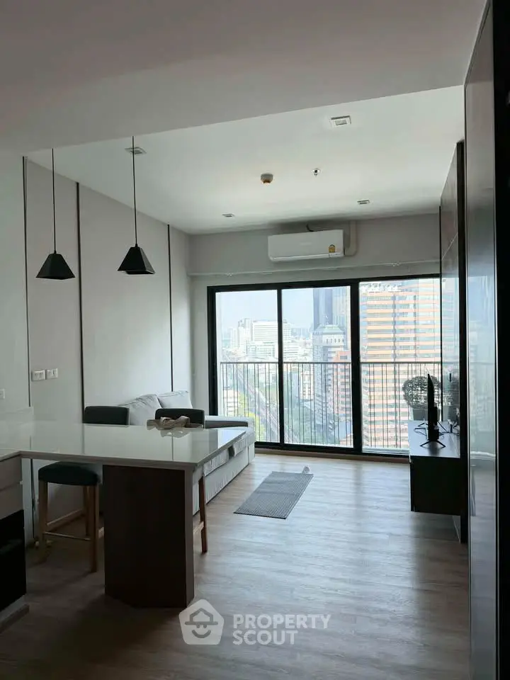 Modern living room with city view and sleek interior design