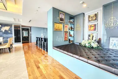 Luxurious modern living room with elegant decor and hardwood floors in a high-end apartment.