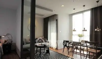 Stylish modern living room with dining area and natural light