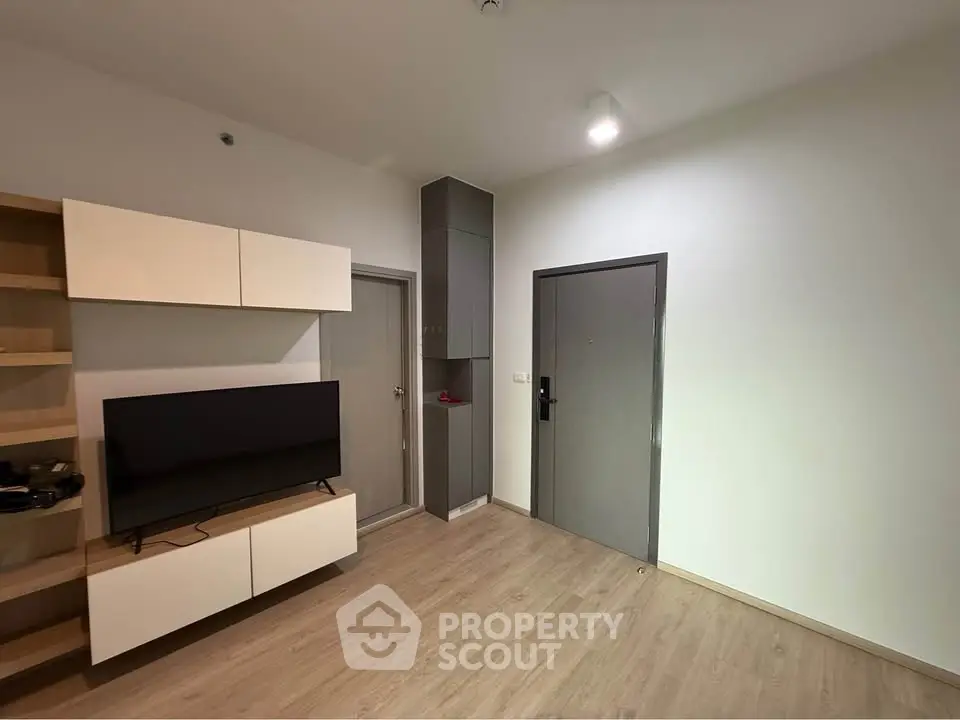 Modern living room with sleek TV setup and minimalist design