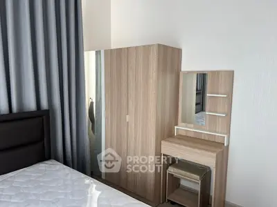 Modern bedroom with sleek wardrobe and stylish vanity set