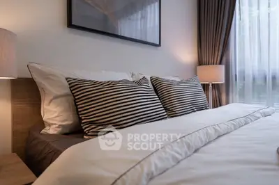 Cozy bedroom with stylish decor and natural light