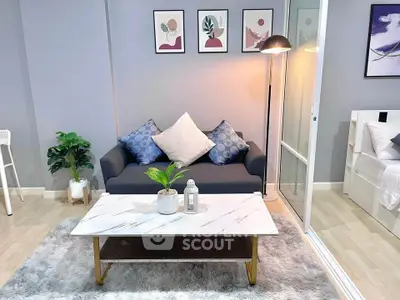 Modern living room with stylish decor and cozy seating area, perfect for relaxation and entertaining.