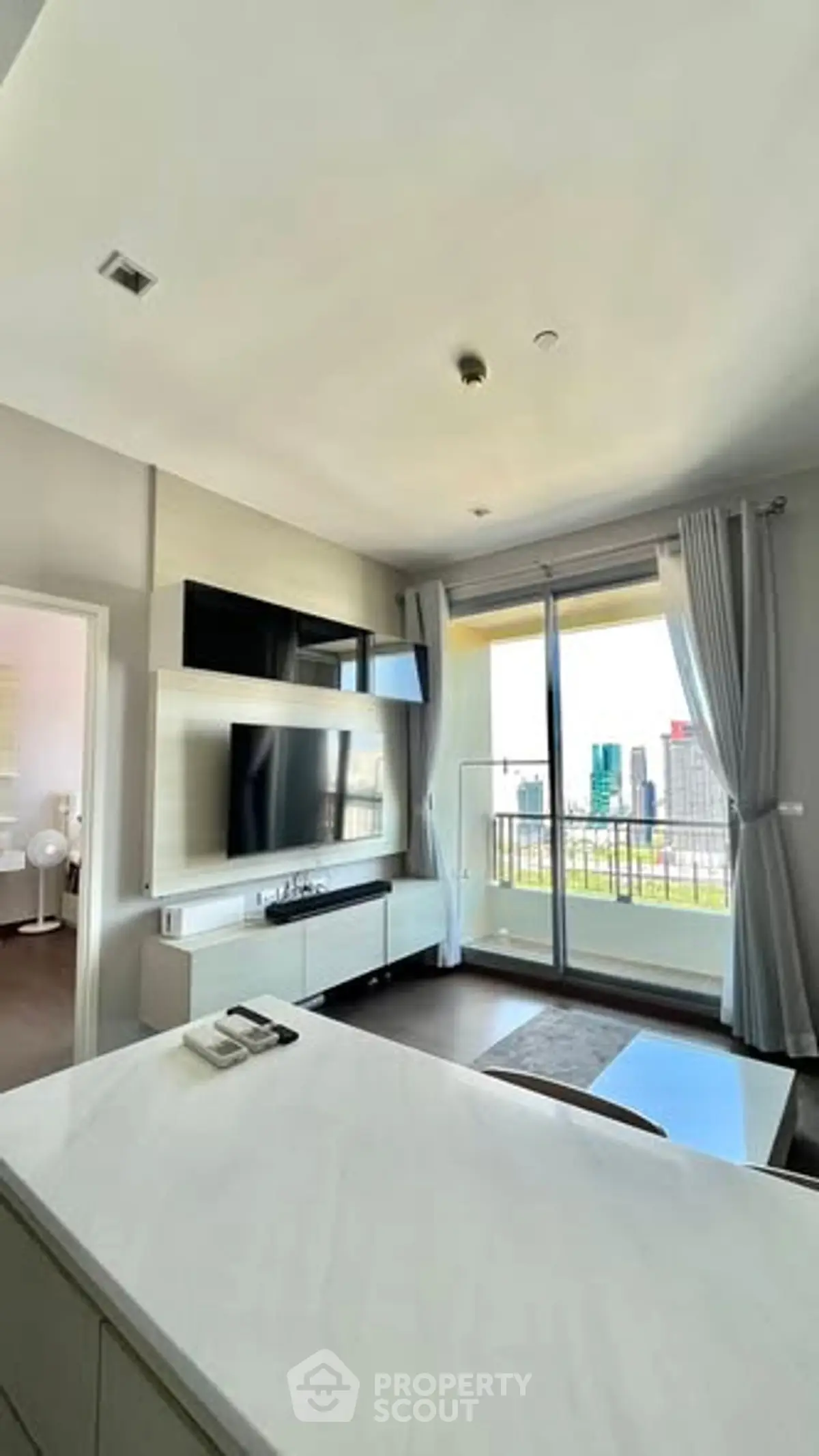 Modern living room with city view and sleek interior design